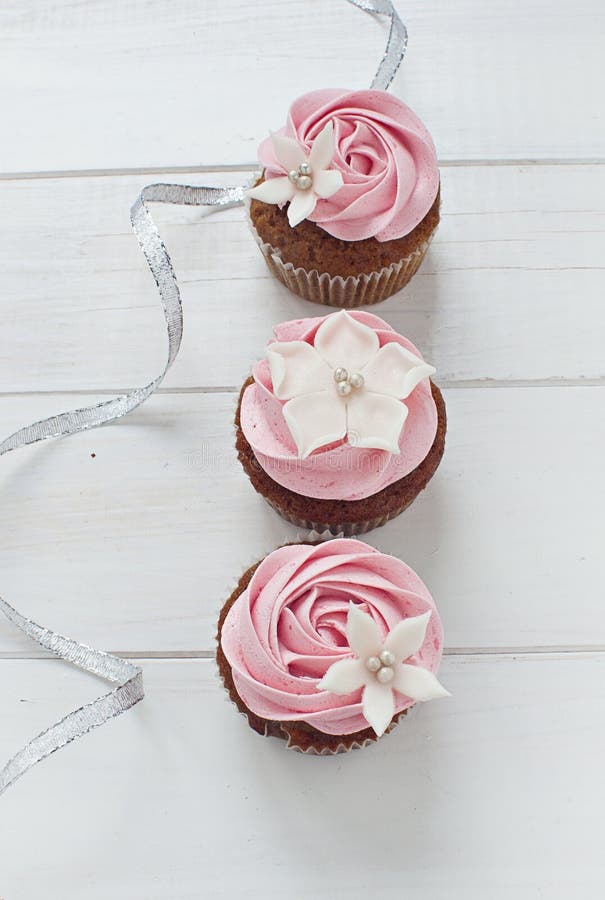 Fondant flower cupcakes stock photo. Image of elegant 27615858