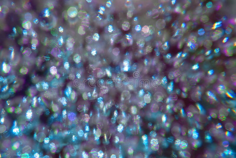 Fondo abstracto del bokeh púrpura con la difracción polarizada foto de archivo libre de regalías Fondo abstracto del bokeh púrpura con la difracción polarizada foto de archivo libre de regalías