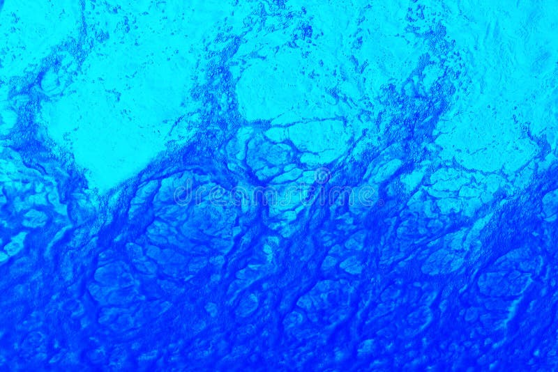 Fondo azul del agua que remolina foto de archivo