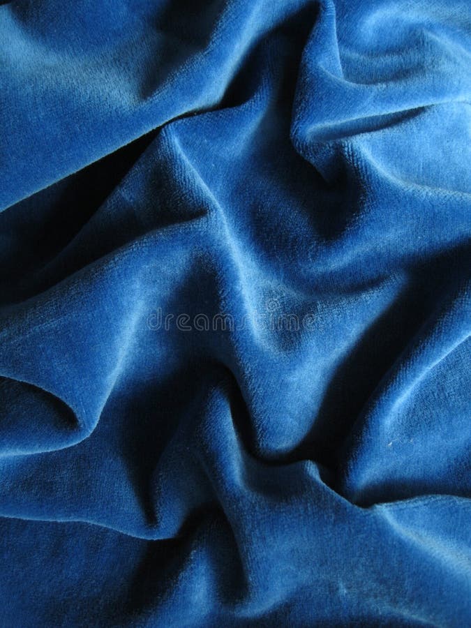 Fondo azul del terciopelo fotografía de archivo libre de regalías Fondo azul del terciopelo fotografía de archivo libre de regalías