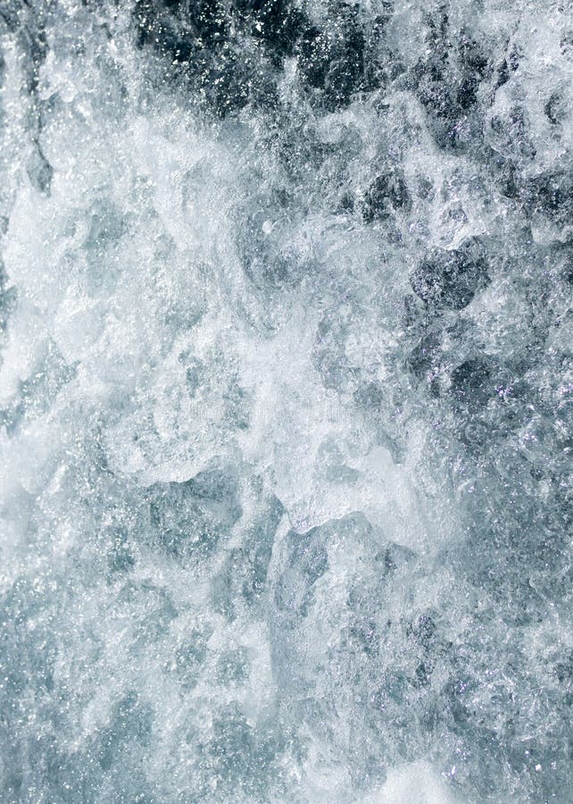 Fondo azul simple de onda de agua blanca del extremo foto de archivo Fondo azul simple de onda de agua blanca del extremo foto de archivo