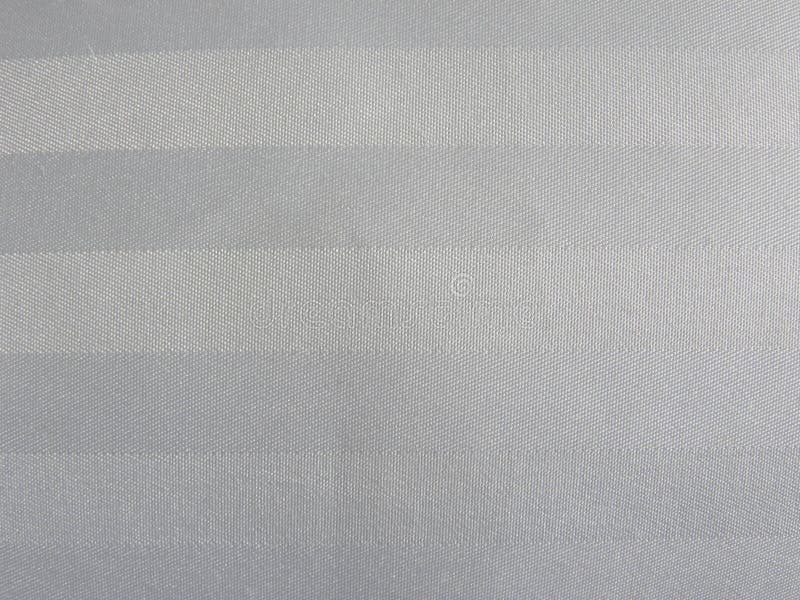 Fondo bianco e grigio del tessuto di cotone di colore fotografia stock libera da diritti Fondo bianco e grigio del tessuto di cotone di colore fotografia stock libera da diritti