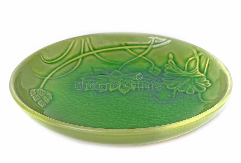 Fondo bianco modellato verde del piatto immagine stock Fondo bianco modellato verde del piatto immagine stock