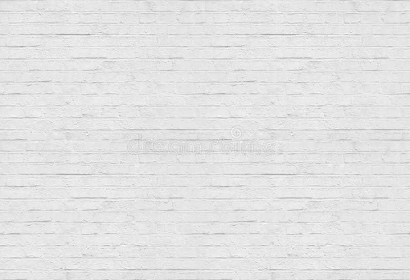 Fondo bianco senza cuciture del modello del muro di mattoni fotografia stock