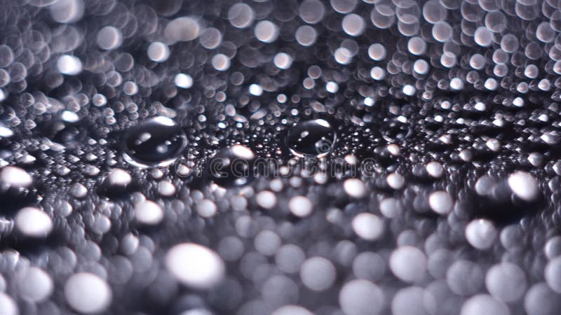 Fondo de Bokeh de descensos grandes del agua almacen de video