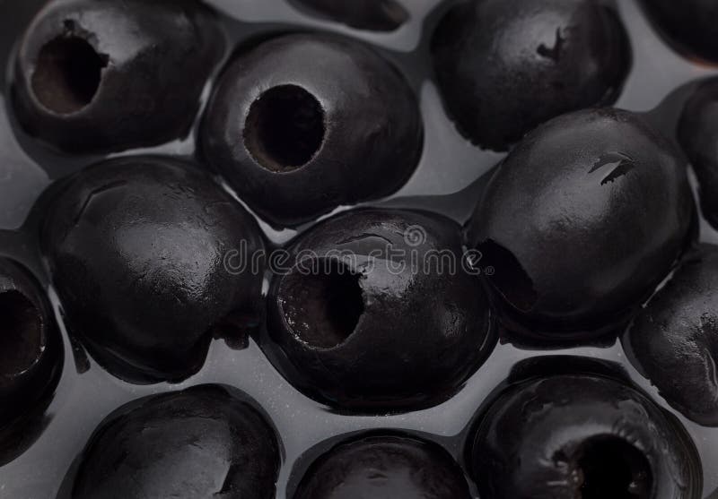 Rebanada Redonda De La Aceituna Negra Imagen de archivo - Imagen de