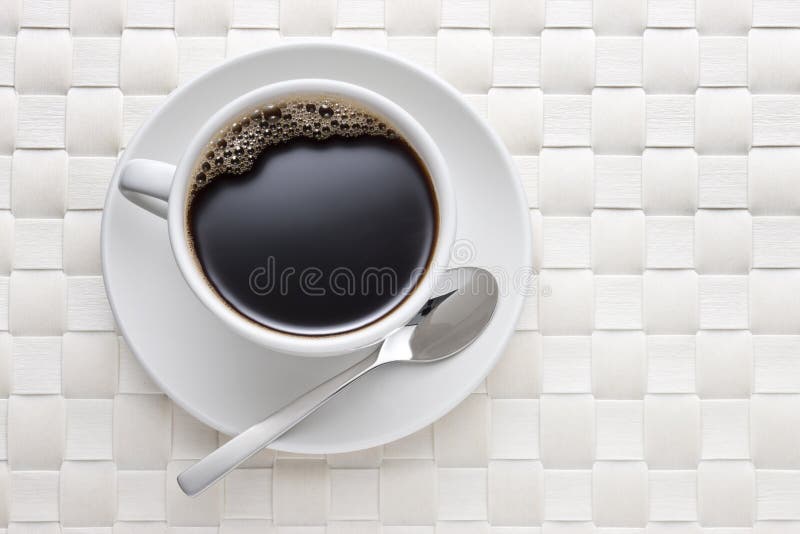 Fondo de la taza del café con leche
