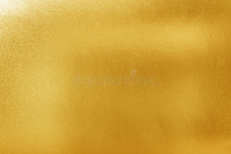fondo de la textura del oro para el diseño Material brillante del metal amarillo o de la superficie de la hoja