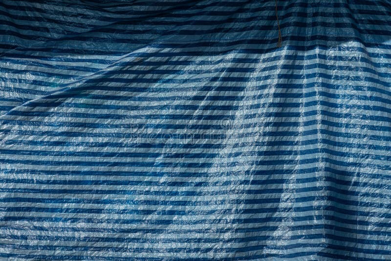 Grandes Bolsas Azules De Plástico Para Guardar Ropa En La Tienda De Ropa  Foto de archivo - Imagen de venta, tela: 167489760