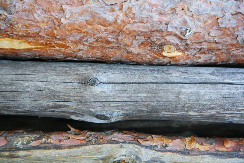 A background texture of a log cabin wall. Wood plank grain texture, wooden board striped old fiber. Wood Texture Background, Wooden Board Grains, Old Floor Striped Planks, Vintage White Timber or Grunge Table. Log cabin background ,The side of a log building. Old rich wood grain texture background with knots. Grunge rustic wood wall, vintage background. High details, hd quality. Natural brown barn wood wall. Wall texture background pattern. Wood planks, boards are old with a beautiful rustic look, style. A background texture of a log cabin wall. Wood plank grain texture, wooden board striped old fiber. Wood Texture Background, Wooden Board Grains, Old Floor Striped Planks, Vintage White Timber or Grunge Table. Log cabin background ,The side of a log building. Old rich wood grain texture background with knots. Grunge rustic wood wall, vintage background. High details, hd quality. Natural brown barn wood wall. Wall texture background pattern. Wood planks, boards are old with a beautiful rustic look, style.