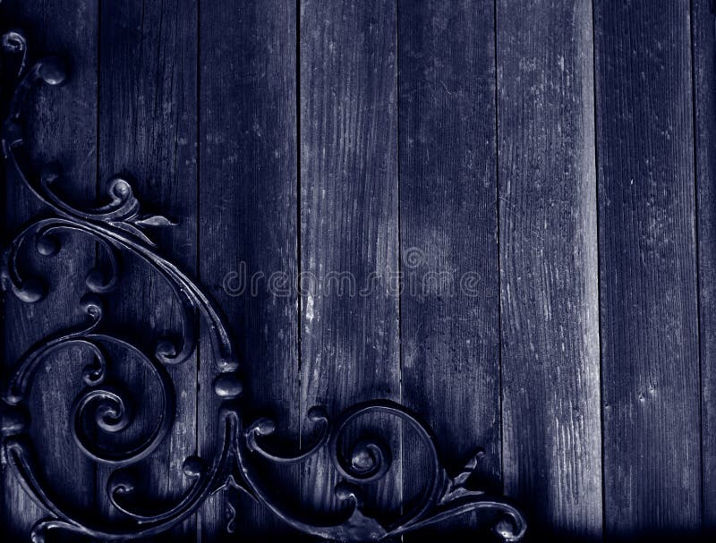 Blue tone old stained wood with wrought iron design. Blue tone old stained wood with wrought iron design