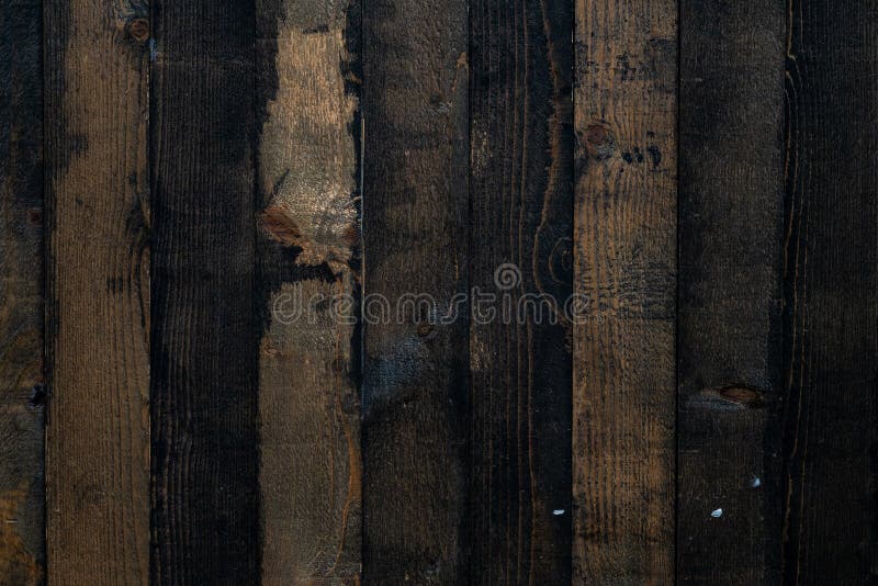 Fondo De Tablas Verticales De Madera Con Barro Negro. Textura De Madera