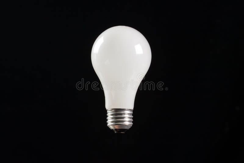 Fondo del nero della lampadina della luce a incandescenza immagini stock Fondo del nero della lampadina della luce a incandescenza immagini stock