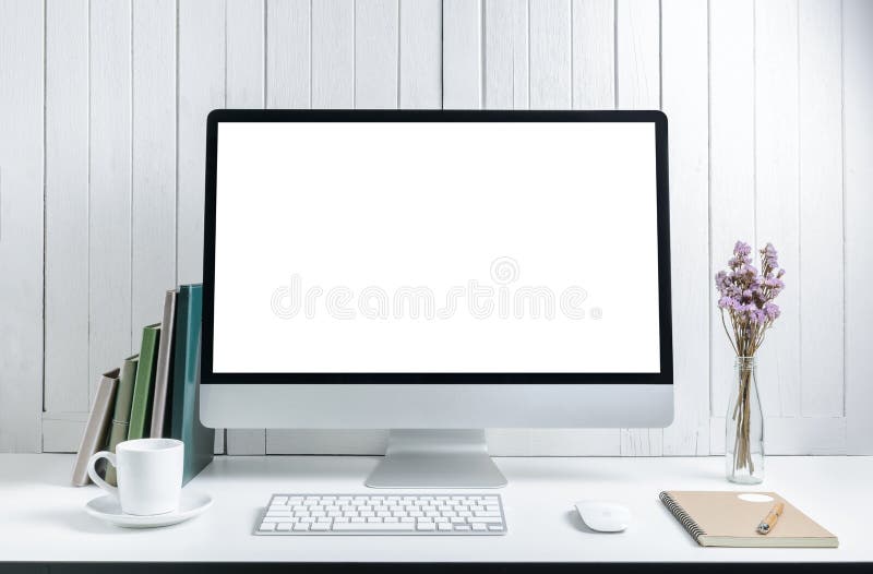 Fondo del posto di lavoro con i comp. moderni del desktop dello schermo bianco in bianco