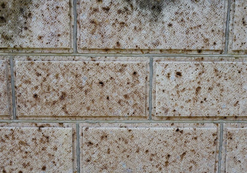 Fondo della parete di pietra di colore di Brown fotografie stock libere da diritti Fondo della parete di pietra di colore di Brown fotografie stock libere da diritti