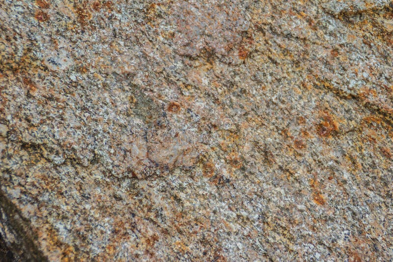 Fondo della roccia eruttiva chiazzata del granito La struttura del grani fotografia stock libera da diritti Fondo della roccia eruttiva chiazzata del granito La struttura del grani fotografia stock libera da diritti