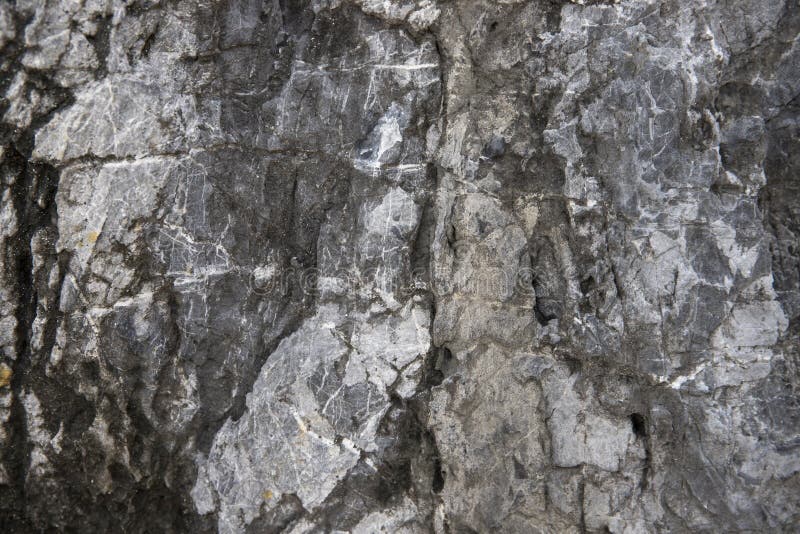 Fondo di pietra incrinato di struttura Superficie naturale afflitta Modello di progettazione di Eco Superficie incrinata della ro fotografia stock libera da diritti Fondo di pietra incrinato di struttura Superficie naturale afflitta Modello di progettazione di Eco Superficie incrinata della ro fotografia stock libera da diritti