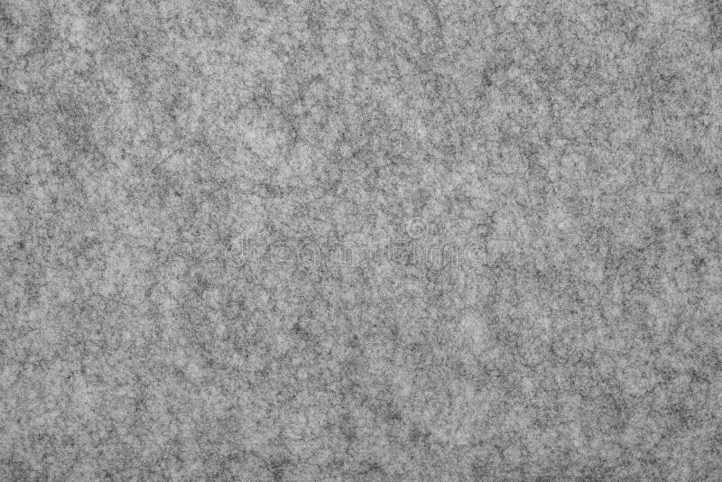 Fondo di trama del feltro. materiale di feltro grigio morbido. superficie di sfondo astratto della trama di tessuto feltrato. foto fotografia stock