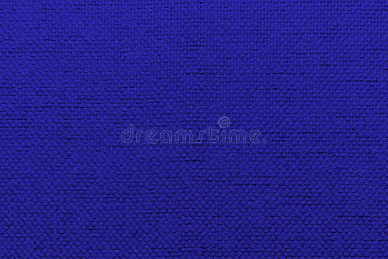 Fondo irregolare del blu del tessuto fotografia stock libera da diritti Fondo irregolare del blu del tessuto fotografia stock libera da diritti
