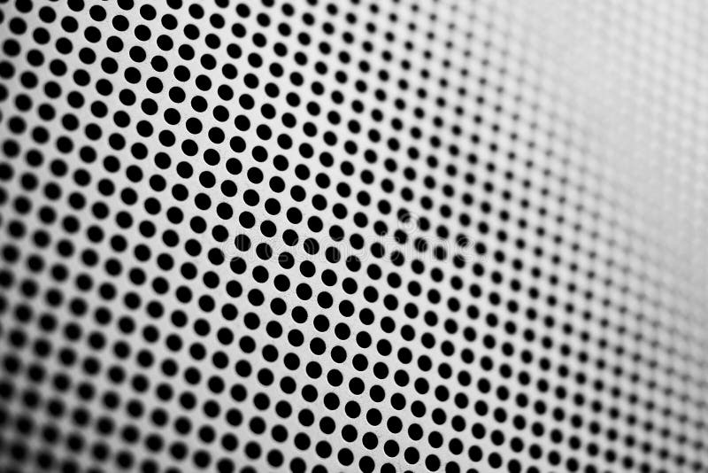 Black and white metallic mesh patterned background. Shallow depth of field. Black and white metallic mesh patterned background. Shallow depth of field....
