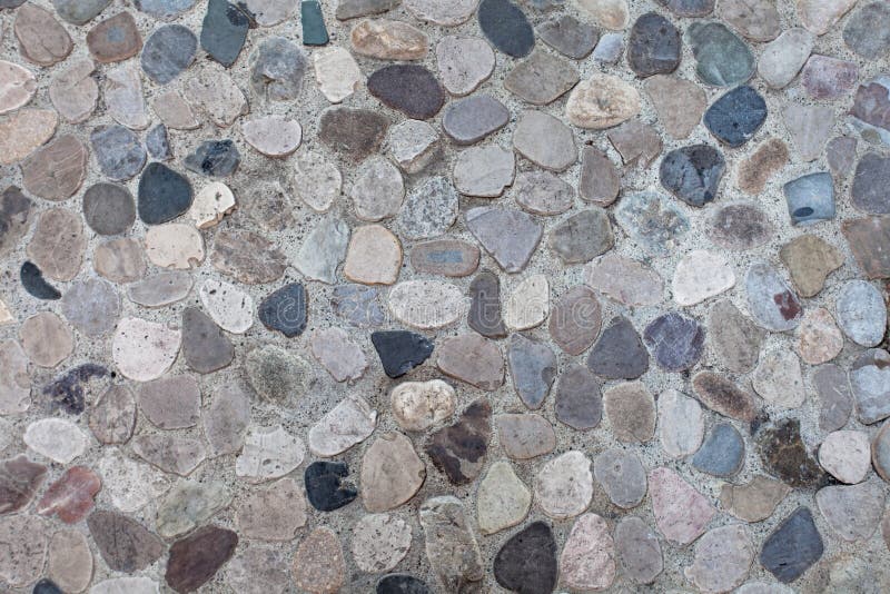 Fondo neutrale del mosaico grigio del ciottolo immagine stock Fondo neutrale del mosaico grigio del ciottolo immagine stock