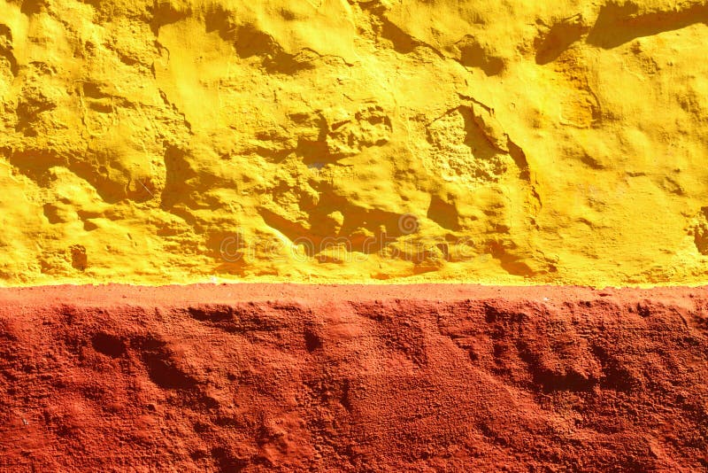 Fondo o textura rojo amarillo de la pared de la pintura fotografía de archivo libre de regalías Fondo o textura rojo amarillo de la pared de la pintura fotografía de archivo libre de regalías