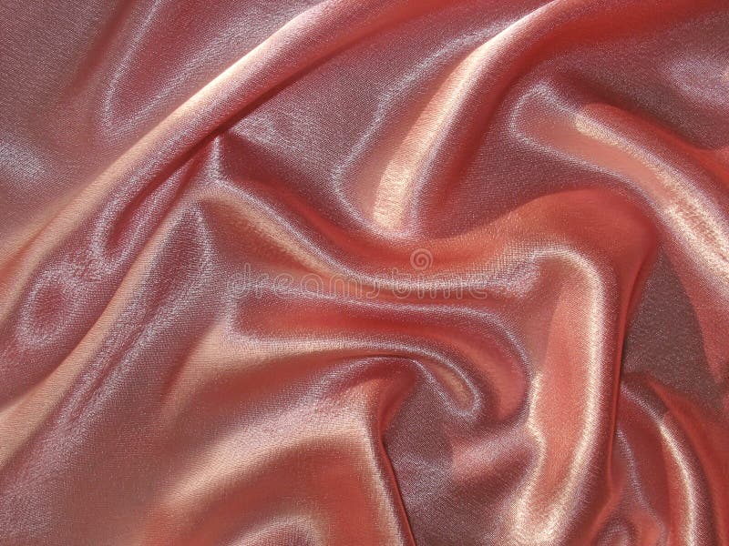 Fondo (peachy) coperto del raso di rosa immagini stock Fondo (peachy) coperto del raso di rosa immagini stock