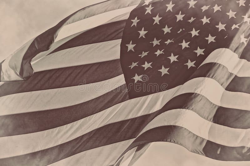 Fondo retro del vintage de la sepia patriótica americana de la bandera de los E.E.U.U. foto de archivo libre de regalías Fondo retro del vintage de la sepia patriótica americana de la bandera de los E.E.U.U. foto de archivo libre de regalías