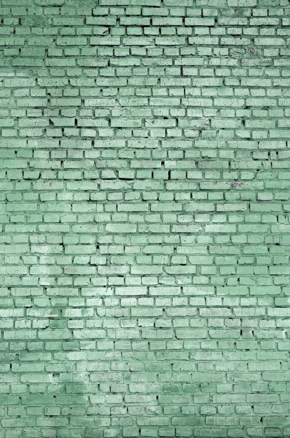Fondo y textura cuadrados de la pared del bloque del ladrillo Pintado en verde fotos de archivo libres de regalías Fondo y textura cuadrados de la pared del bloque del ladrillo Pintado en verde fotos de archivo libres de regalías