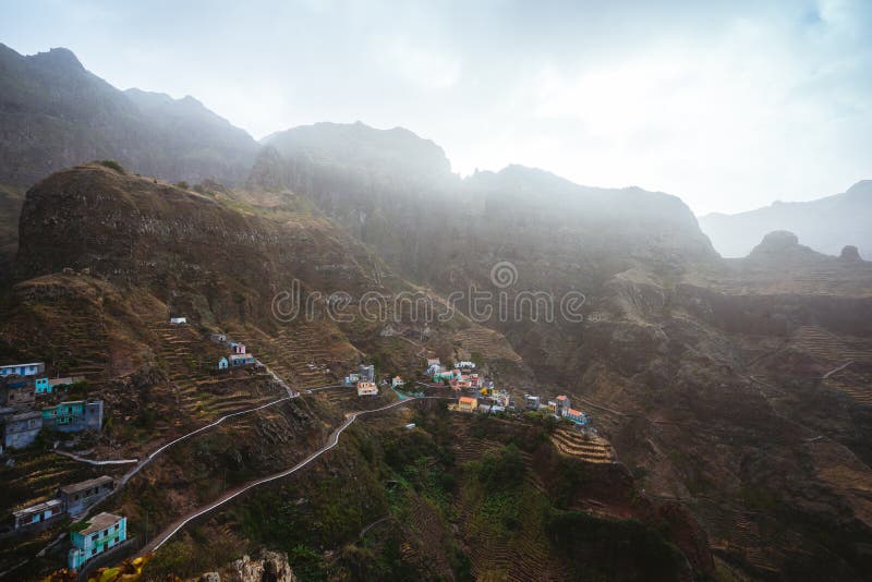 Fontaihas settlement village with Houses nestle into the bluff ridge wall on rocky coast of Santo Antao island