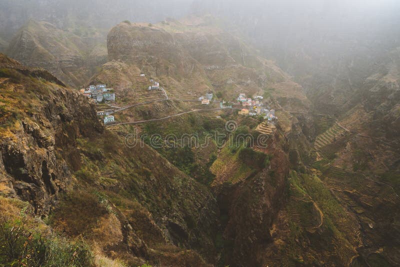 Fontaihas village. Settlement in the rocky coast of Santo Antao island. Houses nestle into the bluff ridge wall