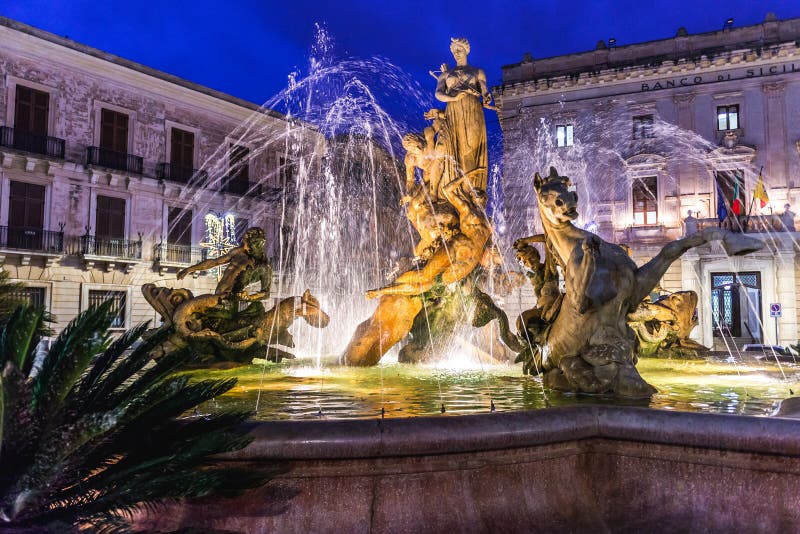 Fountain of Artemis on Ortygia isle, Syracuse city, Sicily Island in Italy. Fountain of Artemis on Ortygia isle, Syracuse city, Sicily Island in Italy