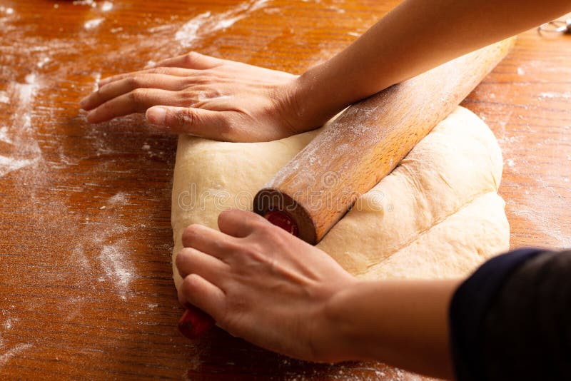 Food bakery concept making bread dought for Cinnamon Roll Braided Bread with copy space. Dought stock images, royalty-free photos and pictures