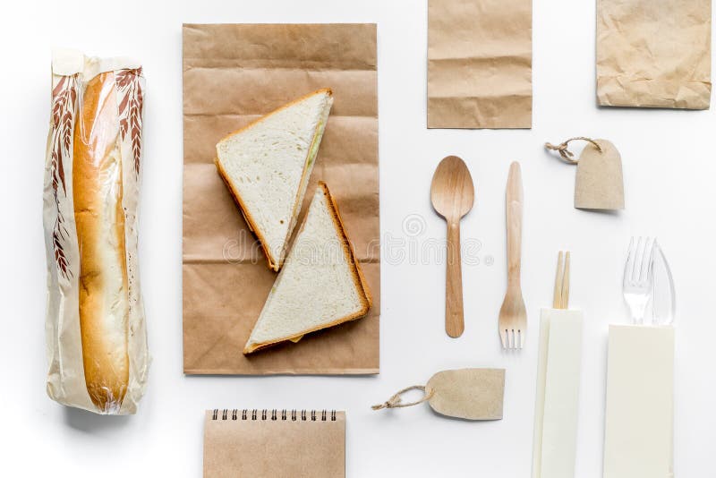 Download Food Delivery With Paper Bags And Sandwich White Background Top View Mock-up Stock Photo - Image ...