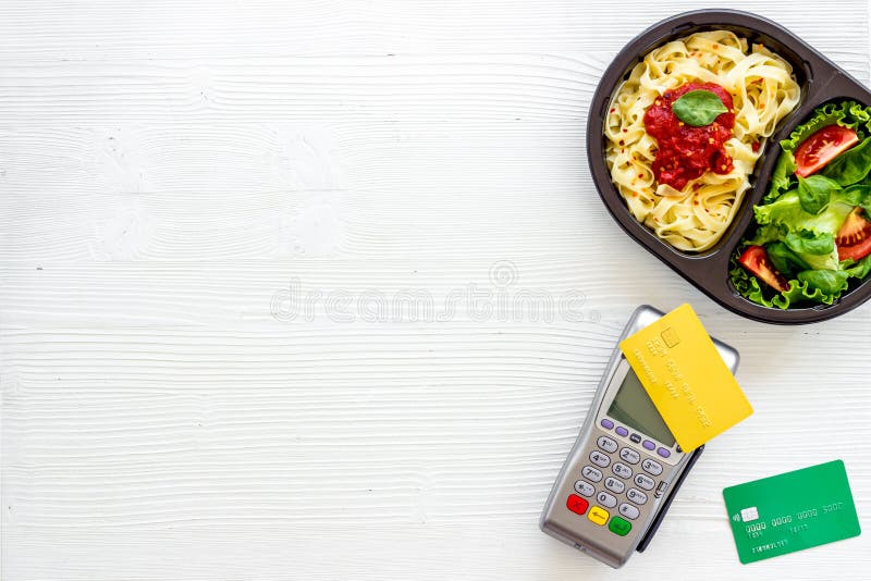 Food Delivery Payment with Terminal and Lunch Boxes with Meal Stock