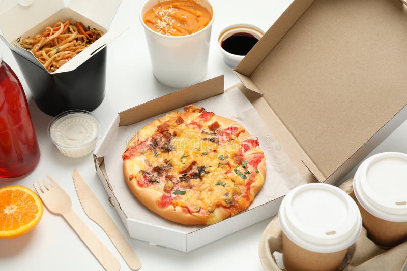 Food Delivery Food in Take Away Boxes on White Background Stock Image