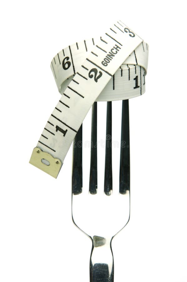 A conceptual diet image of a measuring tape on a fork. Weight watchers stock images, royalty-free photos and pictures