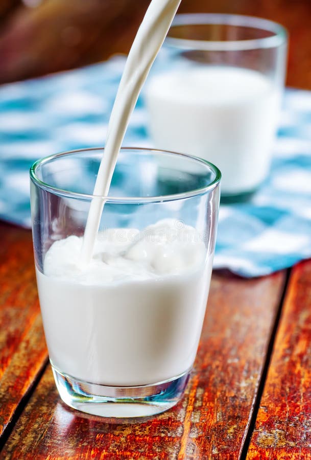 Glass of Cows Milk on the Table Stock Image - Image of nutrition ...