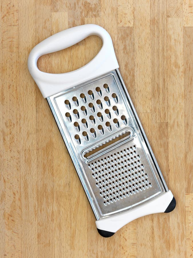 Food grater with nutmeg stock image. Image of nutmeg 28842519