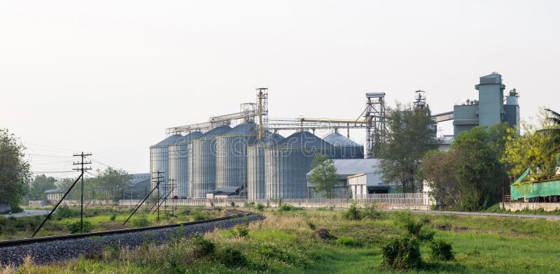 Food industry building with agricultural silos stock photography Food industry building with agricultural silos stock photography