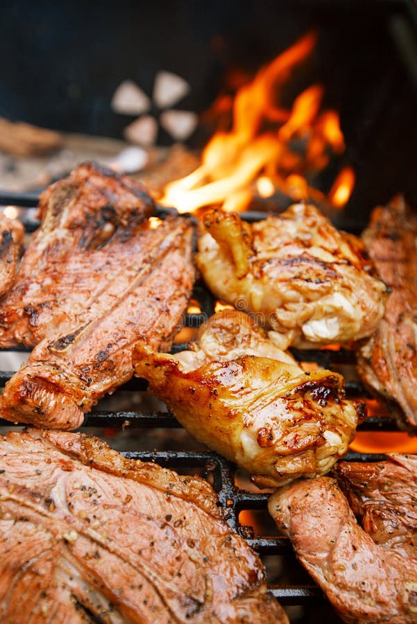 Food meat - chicken and beef on party summer barbecue grill