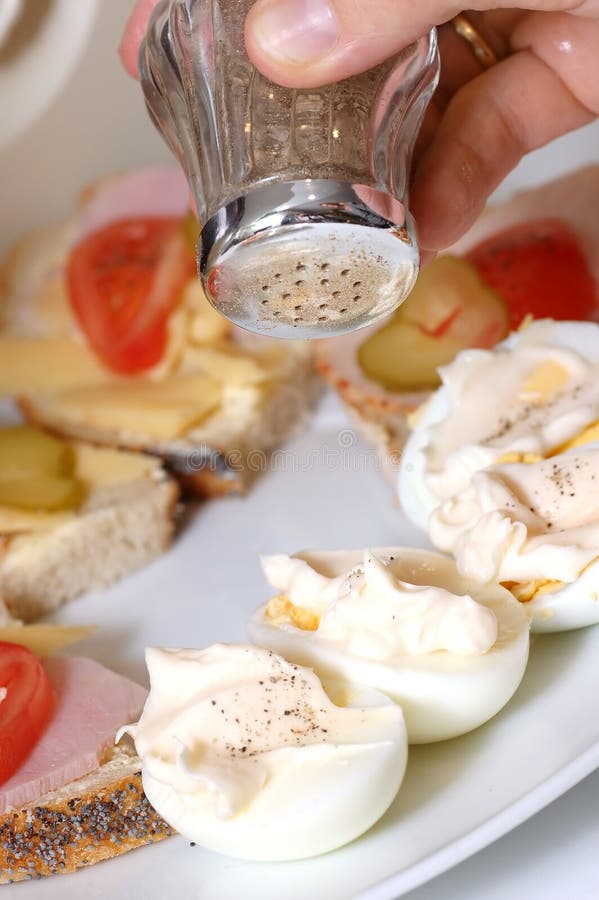 Food Plate and Putting Salt on Eggs Stock Photo Image of garden