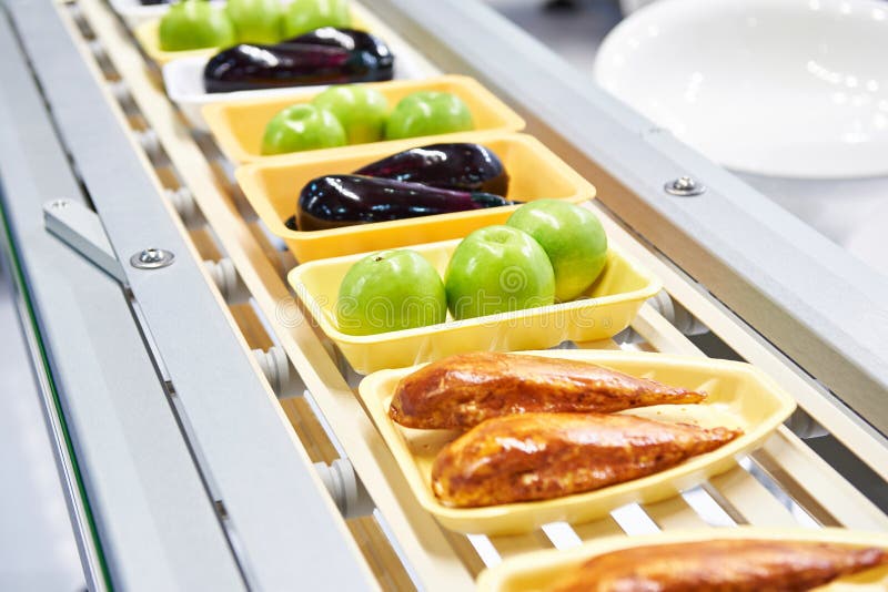 Food products in plastic pack on conveyor stock images Food products in plastic pack on conveyor stock images