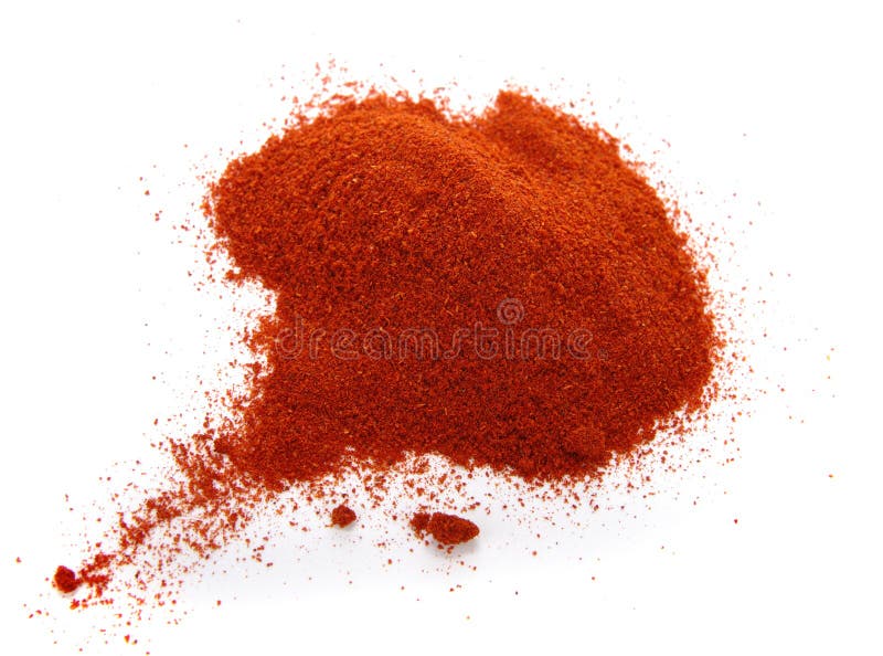 food spice pile of red ground PAPRIKA on white