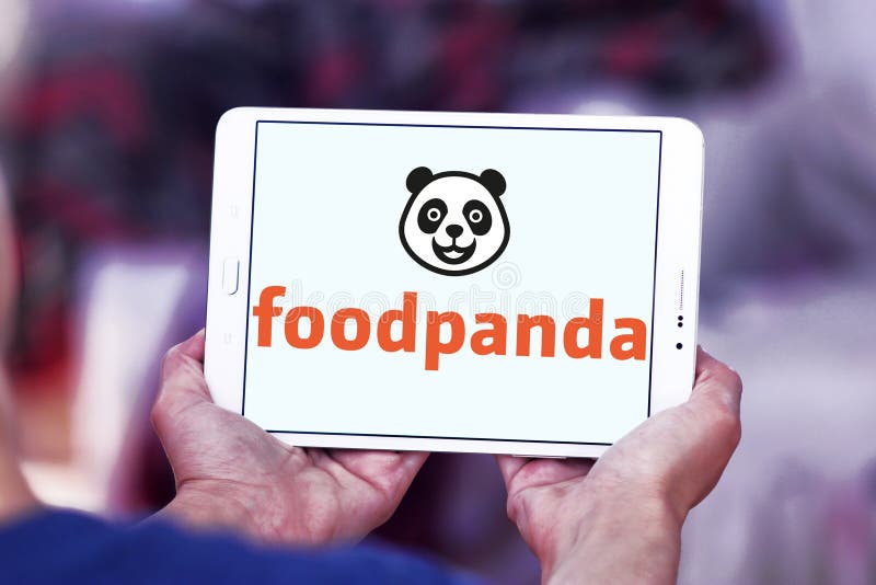 Logo of Foodpanda company on samsung tablet. Foodpanda is a German mobile food delivery marketplace. The service allows users to select from local restaurants and place orders via its mobile applications as well as its websites. Logo of Foodpanda company on samsung tablet. Foodpanda is a German mobile food delivery marketplace. The service allows users to select from local restaurants and place orders via its mobile applications as well as its websites