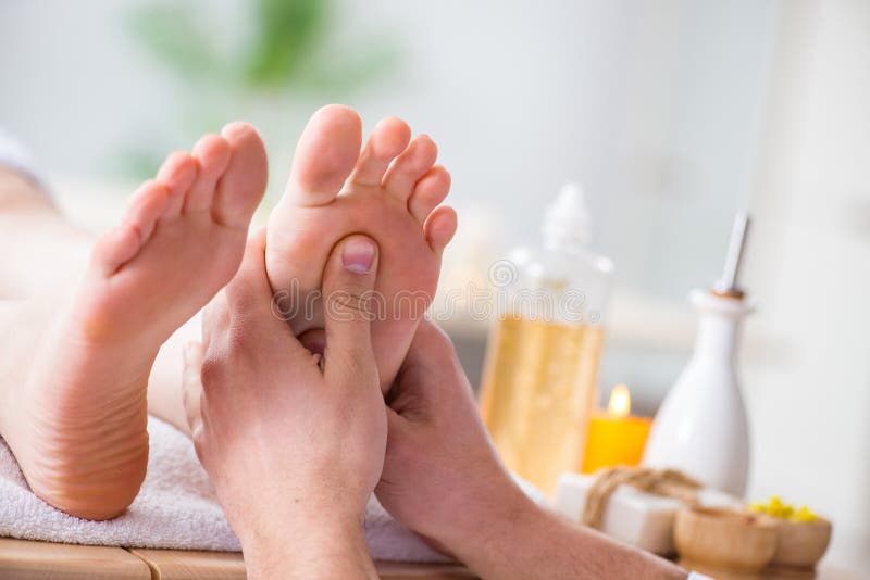 The foot massage in medical spa.