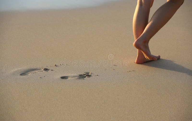 Foot Prints on Beach.