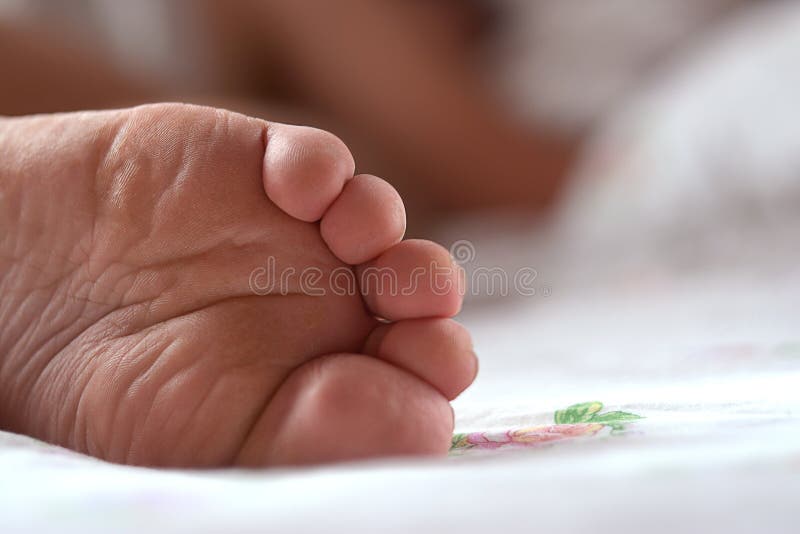 Foot of a sleeping person stock photo. Image of adult 121422932