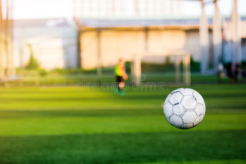 Football Bounce is Behind the Goal Line To Mesh Goal. Stock Photo