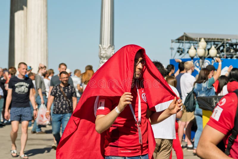 Football fans of the national team of Tunisia with national flag royalty free stock photo Football fans of the national team of Tunisia with national flag royalty free stock photo